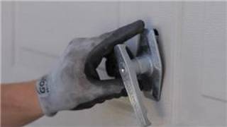 Garage Door Help  How to Replace a Garage Door Lock or Handle [upl. by Ebag]