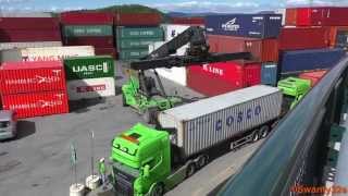 SMV 4535 TB5 Reach Stacker Unloads Containers From Trucks [upl. by Lapo383]